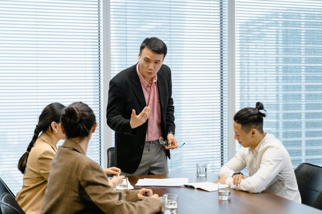 boss talking to employees 7644004